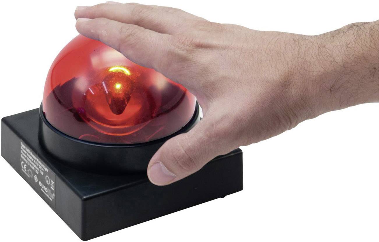 Egy kéz megnyom egy világító piros riasztógombot.