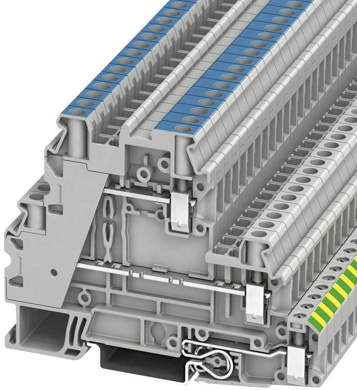 Szürke házban lévő elektromos csatlakozósín, amely a huzalvezetéseket és csatlakozási pontokat mutatja.
