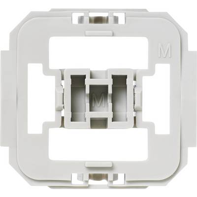 Egy téglalap alakú adapter, amely középen kidomborodó szürke műanyag 'M' betűvel van ellátva, elektromos szerelésekhez alkalmas.