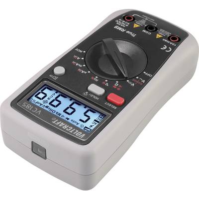 A digitális multiméter 6,969 volt feszültséget mutat a kijelzőn. Digitális kijelzővel és különböző mérési üzemmódok kiválasztására szolgáló gombokkal rendelkezik.