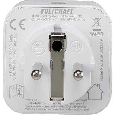 Egy fehér Voltcraft adapter műszaki adatokkal és modellszámmal az elülső oldalán. Csatlakozók a közepén.