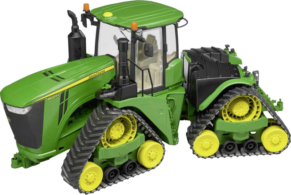 Egy zöld lánctalpas traktor, modern fülkével és sárga kerekekkel. Egy nagy teljesítményű mezőgazdasági jármű modellje.
