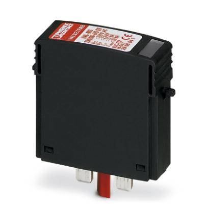Egy fekete elektromos eszköz két fémcsatlakozóval és piros jelölésekkel a felső részén, valószínűleg egy biztosítóelem.