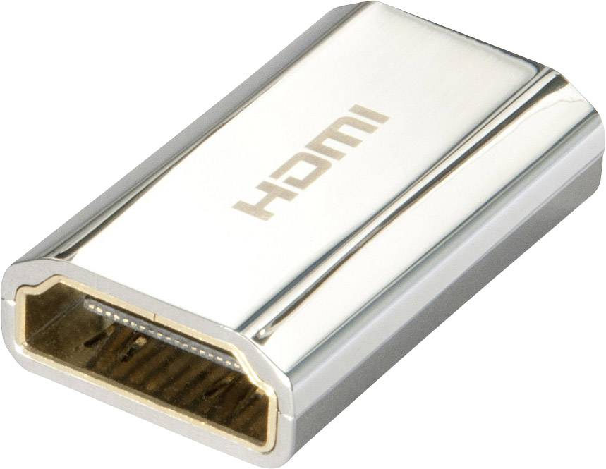 Egy ezüst HDMI-adapter "HDMI" felirattal. Csatlakoztatja a HDMI-porttal rendelkező eszközöket, lehetővé teszi a digitális hang- és videojel átvitelét.