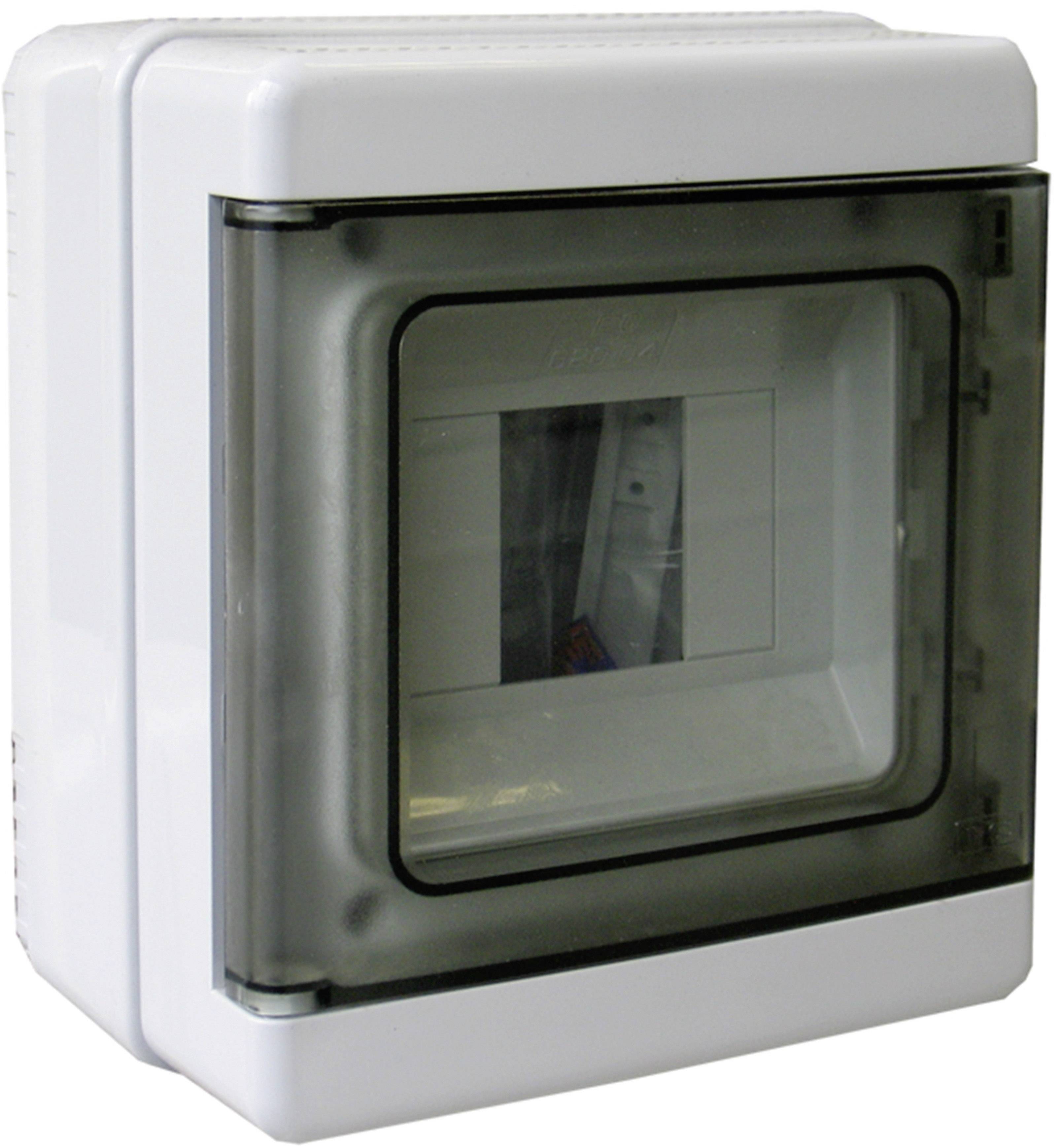 Egy fehér, téglalap alakú biztosítékdoboz átlátszó tetővel, amely a falra van szerelve.