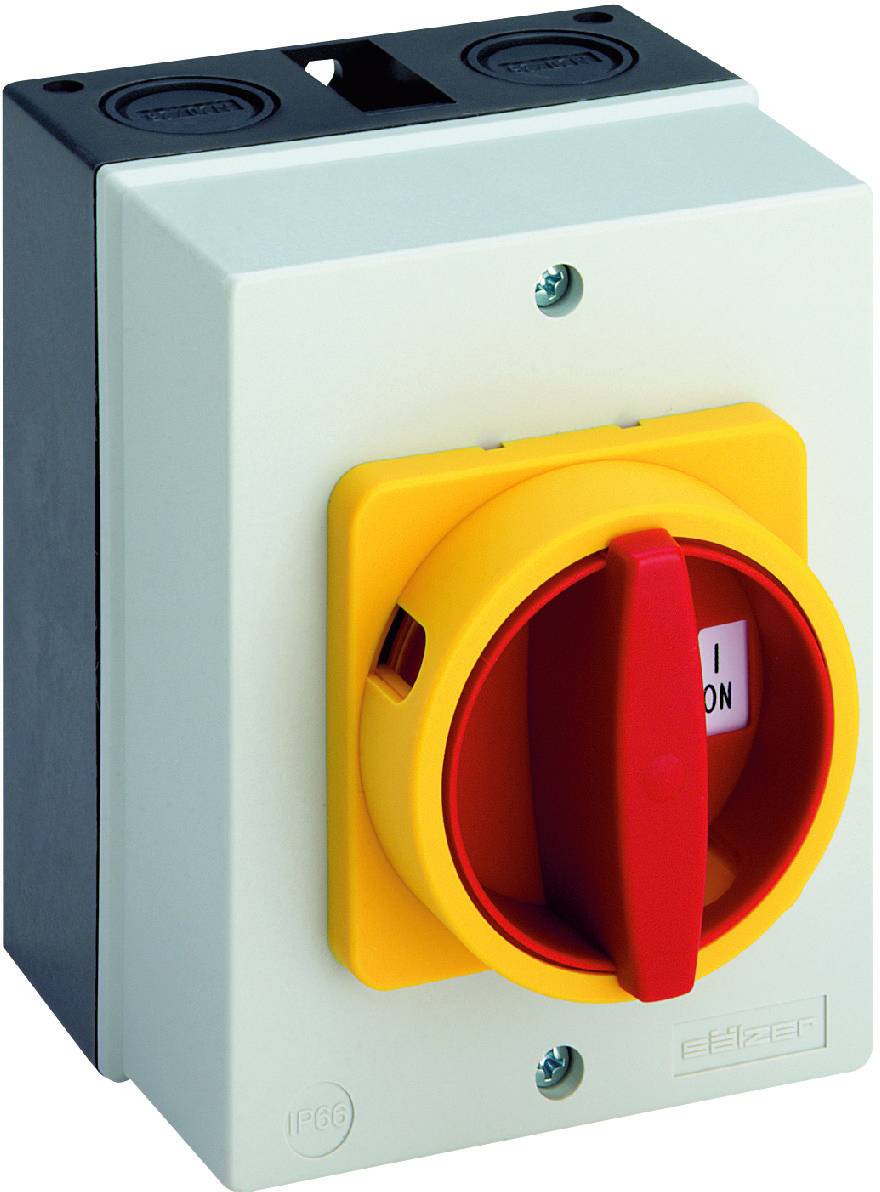 Ipari kapcsoló piros tekerőgombbal sárga háttéren "I" (Be) pozícióban. A ház szürke színű.
