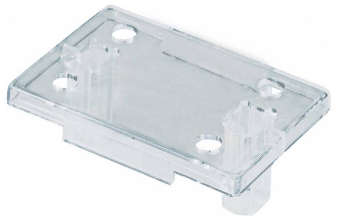 Un coperchio in plastica trasparente rettangolare con quattro fori negli angoli e due supporti cilindrici rialzati su ciascuna estremità.