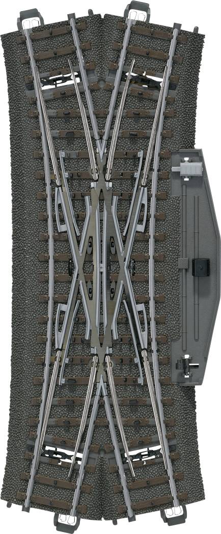 Binario per modellismo ferroviario con incrocio e scambio, composto da diversi tratti di rotaie e traverse su un letto di ballast scuro.