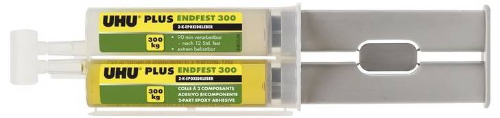 Adesivo bicomponente UHU Plus Endfest 300, siringa verde-gialla. Etichettata con '300 kg'. Adatto per connessioni estremamente resistenti.