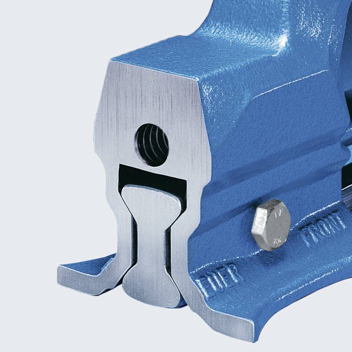 Pezzo blu in metallo con fissaggio a vite e estremità curve, probabilmente parte di una macchina o dispositivo industriale.