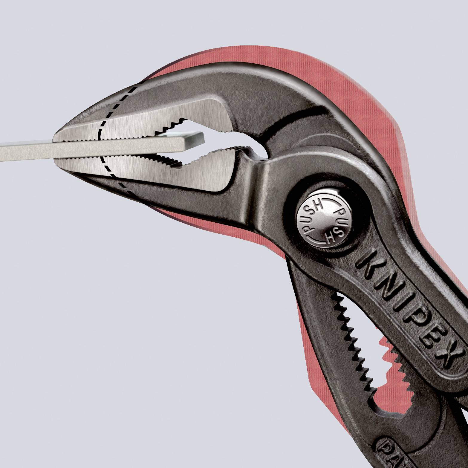 Una pinza rossa con la scritta 'KNIPEX', aperta e che afferra un sottile pezzo di metallo.