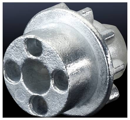 Componente metallico con più aperture circolari e forma cilindrica, probabilmente parte di una macchina o di un veicolo.