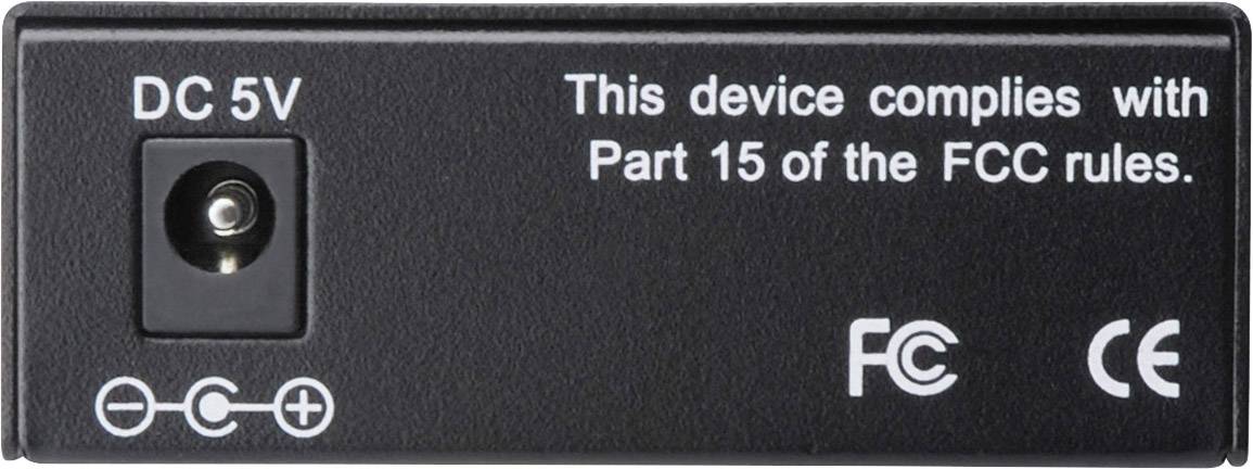 Retro di un dispositivo elettronico con un ingresso di corrente continua e testo: 'Questo dispositivo è conforme alla Parte 15 delle norme FCC'.
