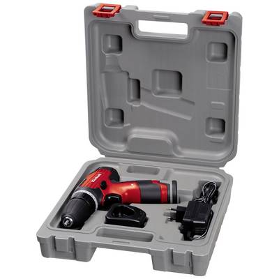 Un cacciavite rosso a batteria in un custodia grigia aperta in plastica, con caricabatterie e batteria di ricambio, su una superficie bianca.