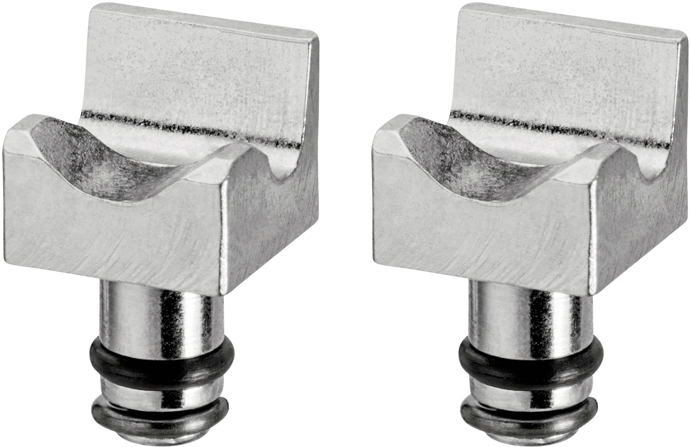 Due valvole metalliche argentate a forma di U con guarnizioni di gomma nera poste una accanto all'altra su sfondo bianco.