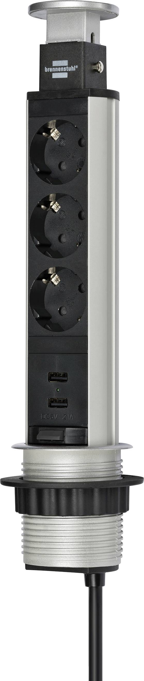 Presa di corrente pop-up cilindrica nera con tre prese AC e due porte USB, montata in un alloggiamento da piano di lavoro argentato con cavo di alimentazione.