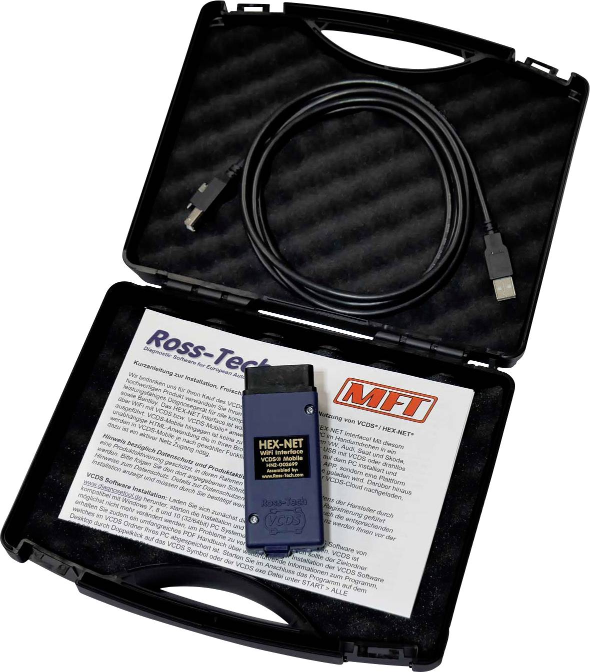 Unità diagnostica portatile con cavo USB in una custodia nera aperta. Dispositivo principale etichettato con 'HEX-NET'.