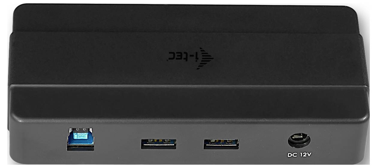 'Dispositivo elettronico nero con tre porte USB e ingresso di alimentazione CC 12V.'