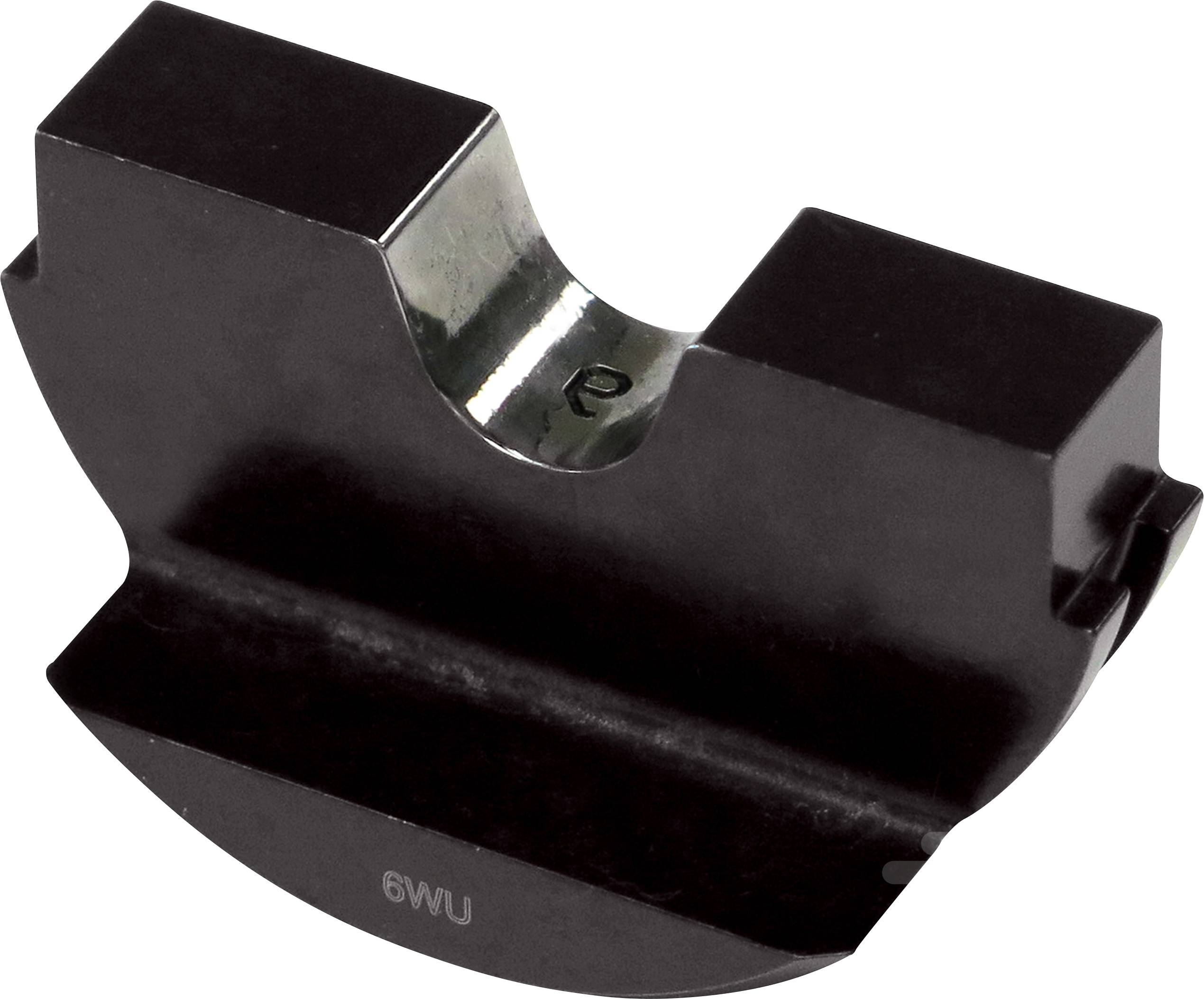 Un blocco nero e metallico con un intaglio a semicerchio e una superficie lucente sul lato interno.