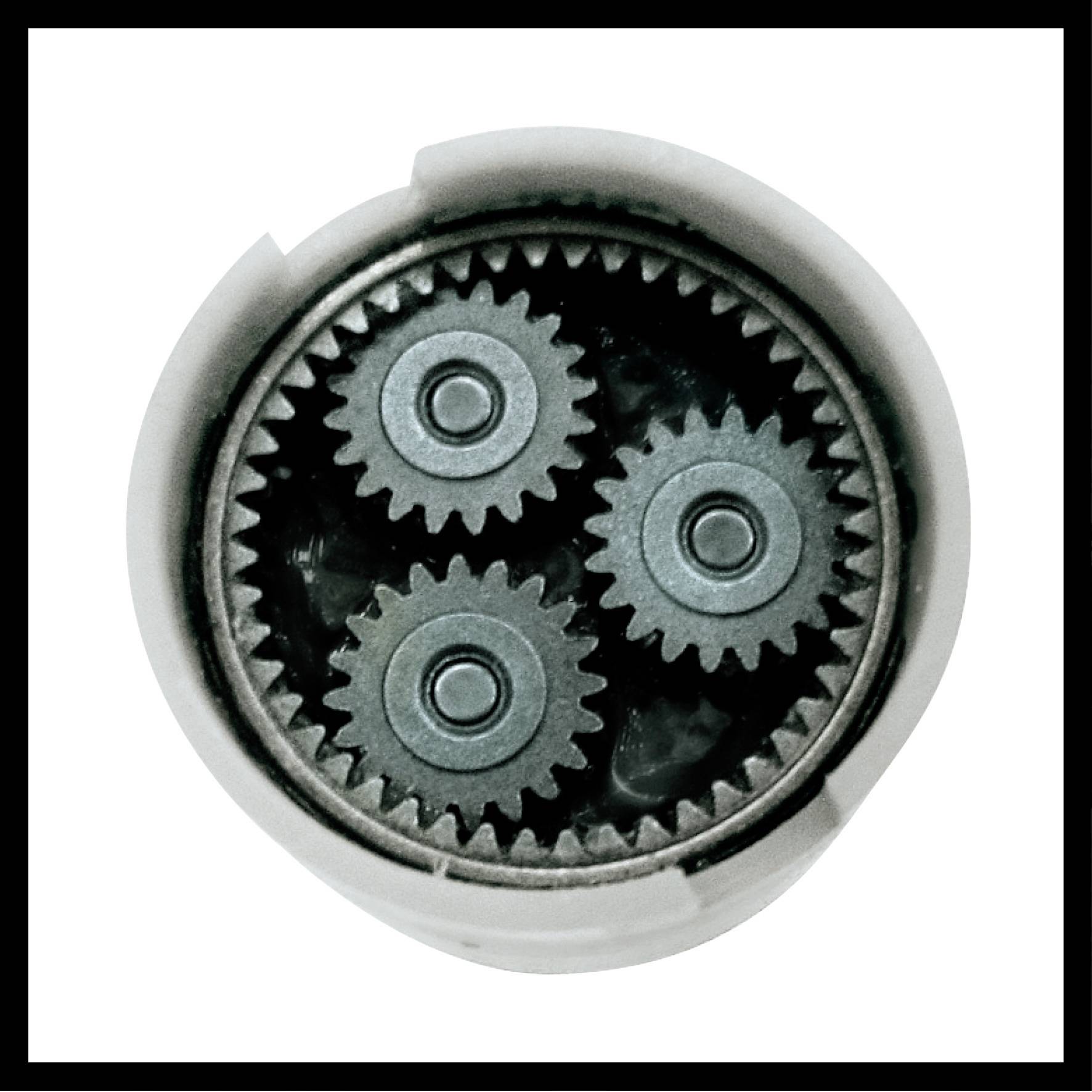 Meccanismo a ingranaggi con tre piccole ruote dentate disposte all'interno di una ruota dentata circolare più grande, all'interno di un alloggiamento.