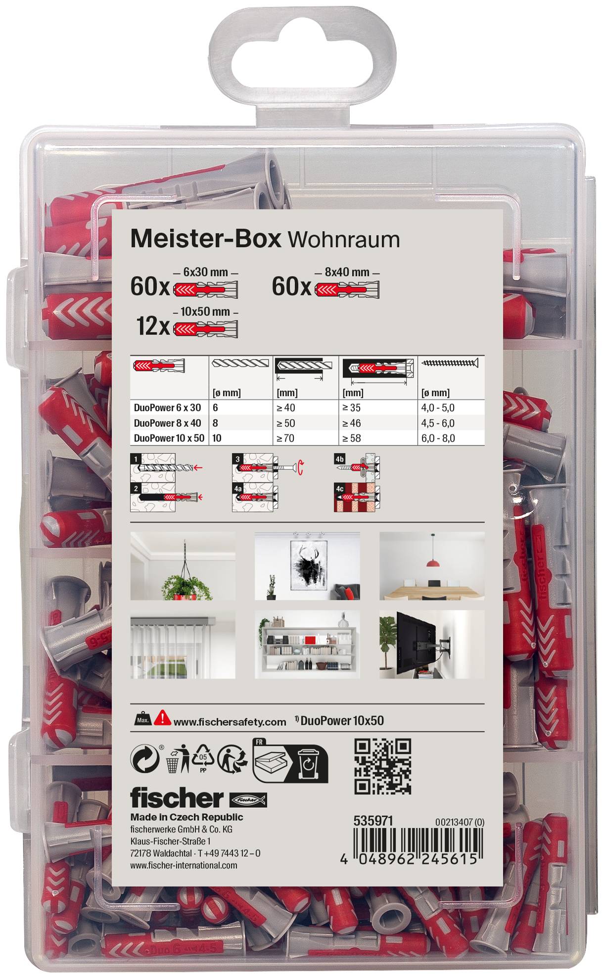 Scatola di stoccaggio in plastica trasparente etichettata 'Meister-Box Wohnraum' con ferramenta di montaggio a parete rossa e tappi per viti, mostrando quantità, dimensioni, diagrammi di utilizzo e un codice a barre sul fronte della confezione.
