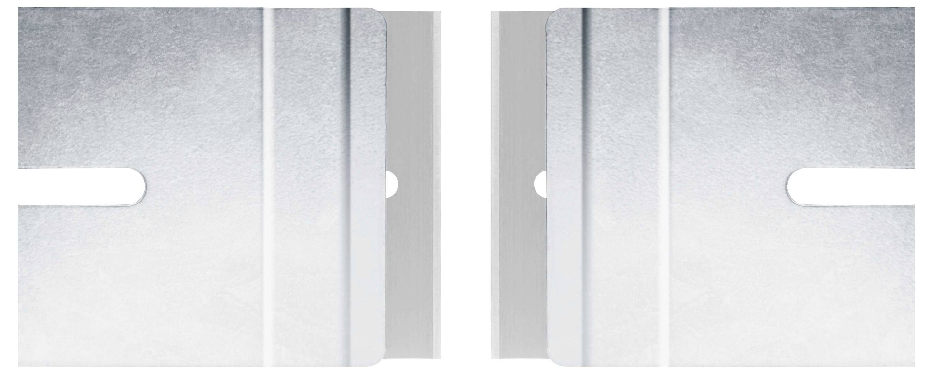 Due lastre metalliche rettangolari con rientranze, disposte simmetricamente una accanto all'altra. Sono di colore argento con strisce grigie.