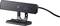 Webcam nera con cavo USB e base di supporto, adatta per il montaggio su desktop, che mostra un piccolo obiettivo e una luce LED sul lato frontale.