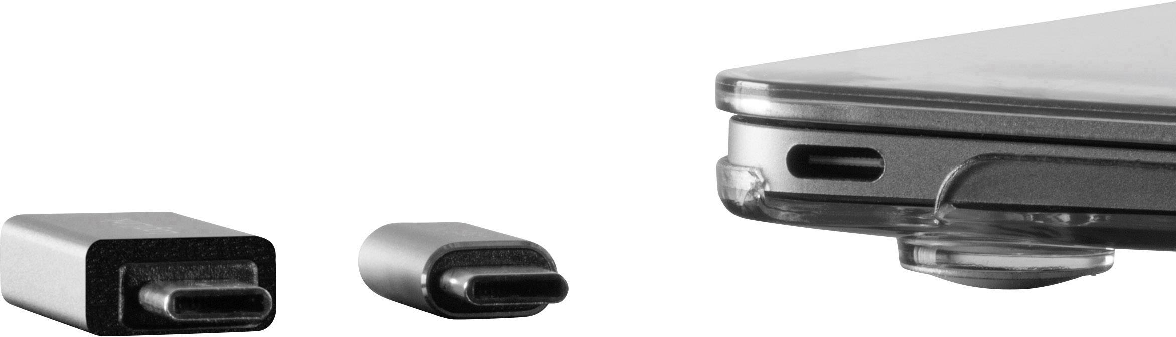 Primo piano di due connettori USB-C accanto a un laptop con porta USB-C. Mostra la compatibilità e le possibilità di connessione.
