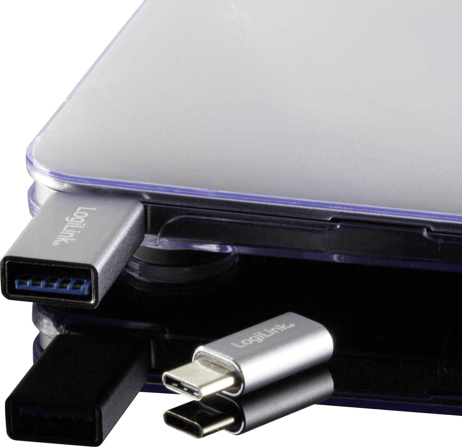Un hub USB con più porte: in alto due porte USB-A e in basso una porta USB-C. I dispositivi sono collegati a due delle porte.