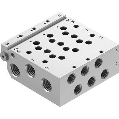 Blocco metallico con diversi fori e filettature su vari lati, presumibilmente utilizzato per il collegamento di tubazioni o componenti meccanici.