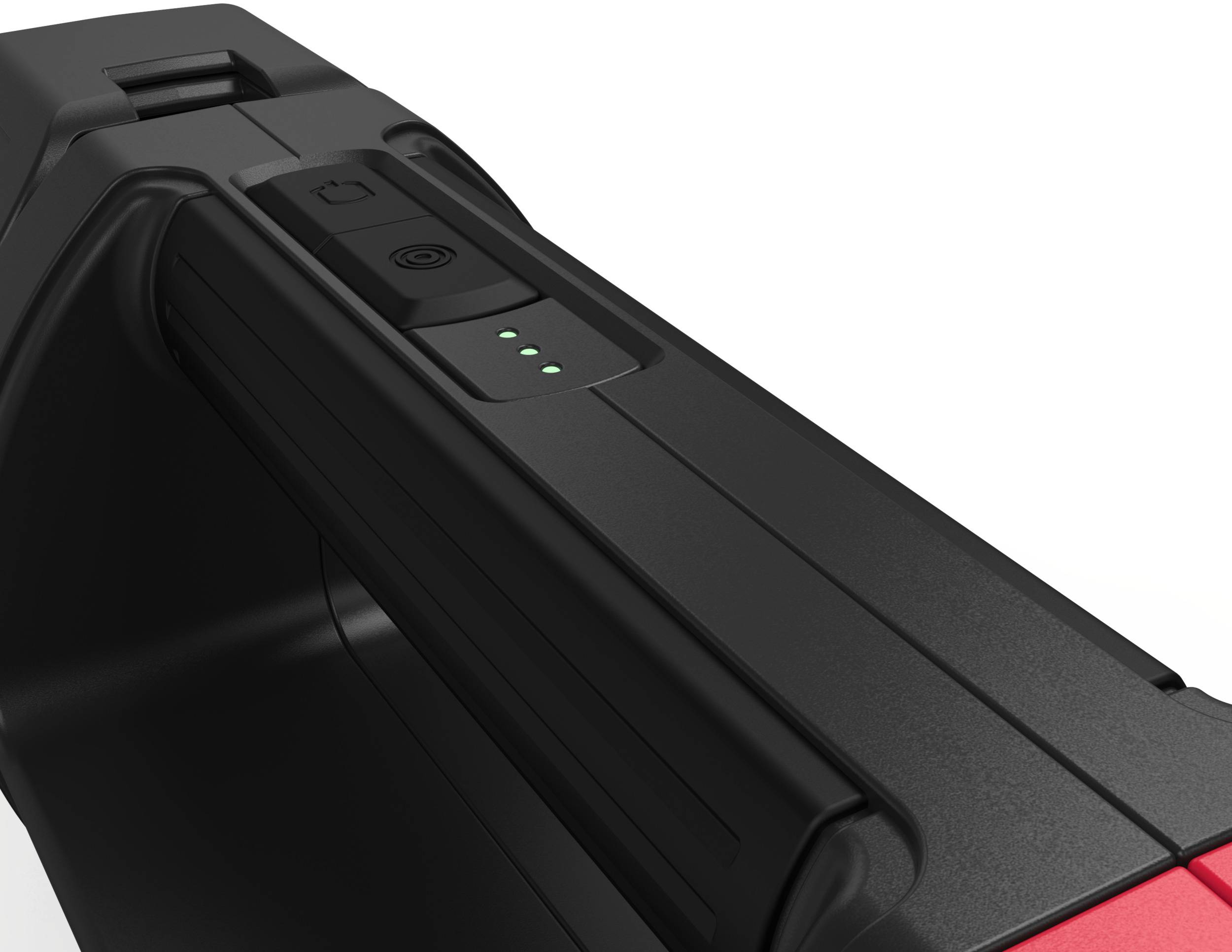 Primo piano di un dispositivo elettronico nero con tre indicatori LED verdi sulla parte superiore che mostrano lo stato di funzionamento.