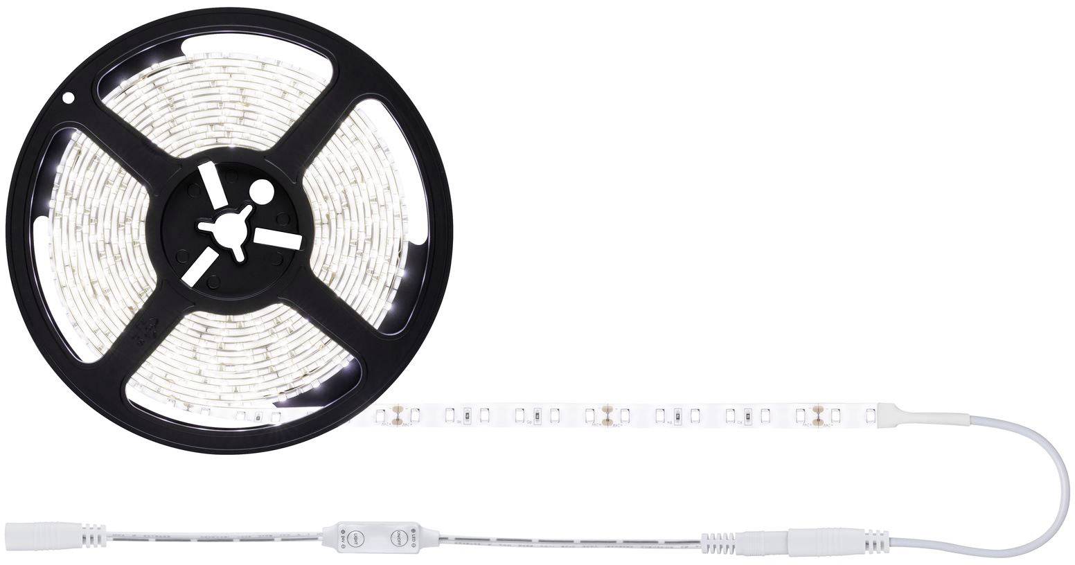 Striscia LED su rotolo, parzialmente srotolata. Ideale per decorazione o illuminazione, collegata a un cavo elettrico.