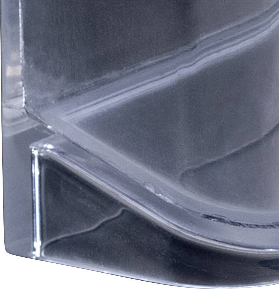 Struttura di vetro trasparente irregolare con linee curve e riflessi di luce.