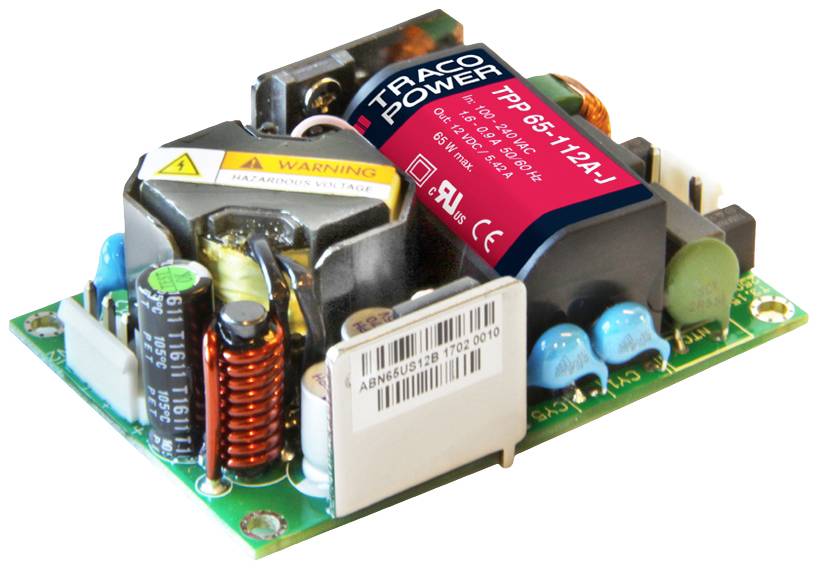 Modulo di alimentazione elettronico con dissipatore di calore, induttanze e condensatori blu su una scheda; produttore: TRACO Power.