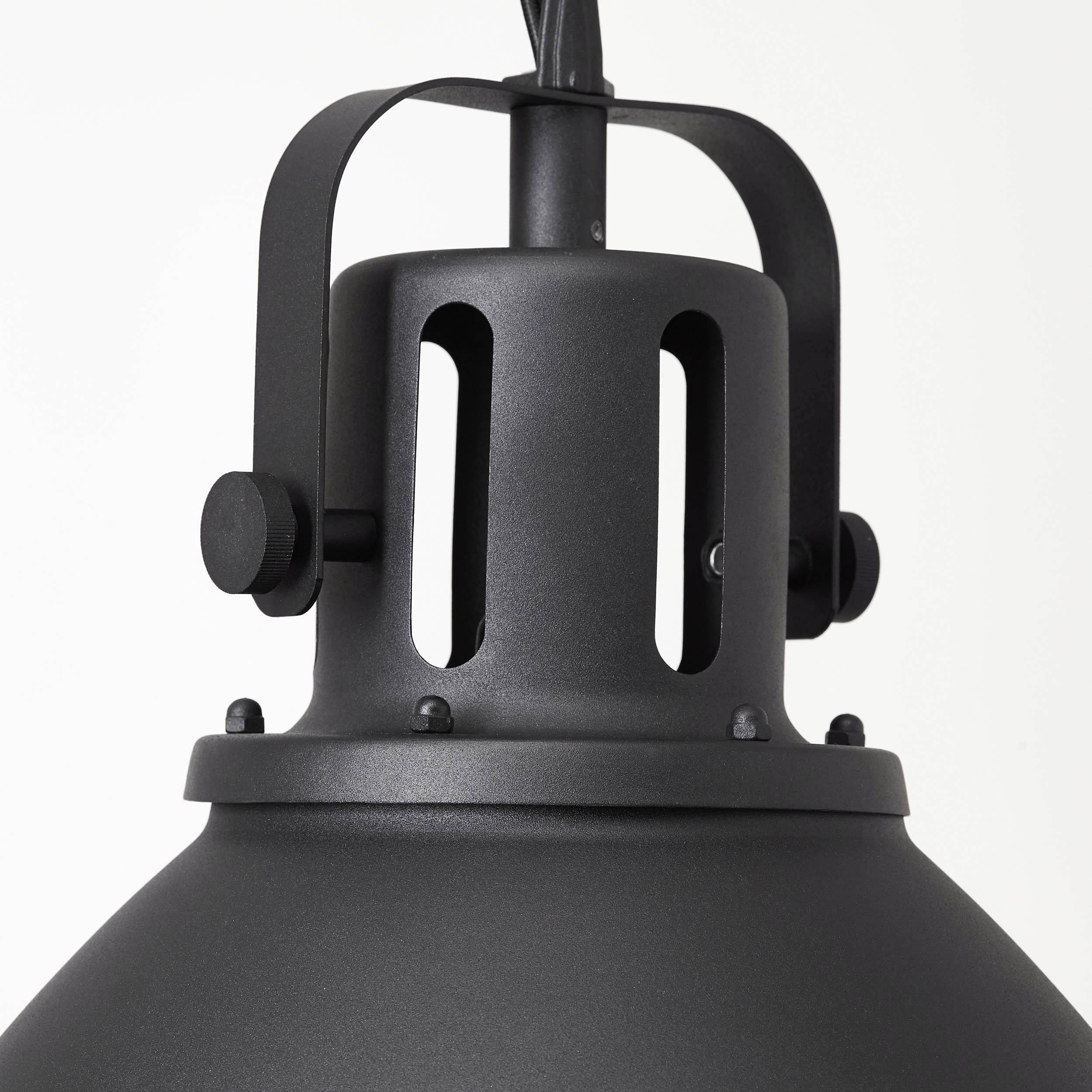 Lampada industriale da soffitto nera con testa orientabile, costruzione robusta in metallo e viti a vista.