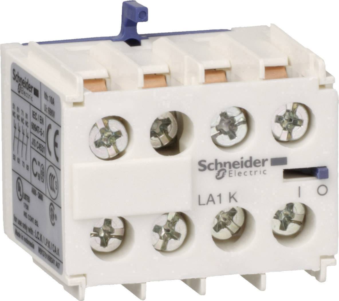 'Schneider Electric LA1 K' viene mostrato su un blocco di contatto elettrico. Il blocco ha diverse morsettiere a vite ed è bianco.