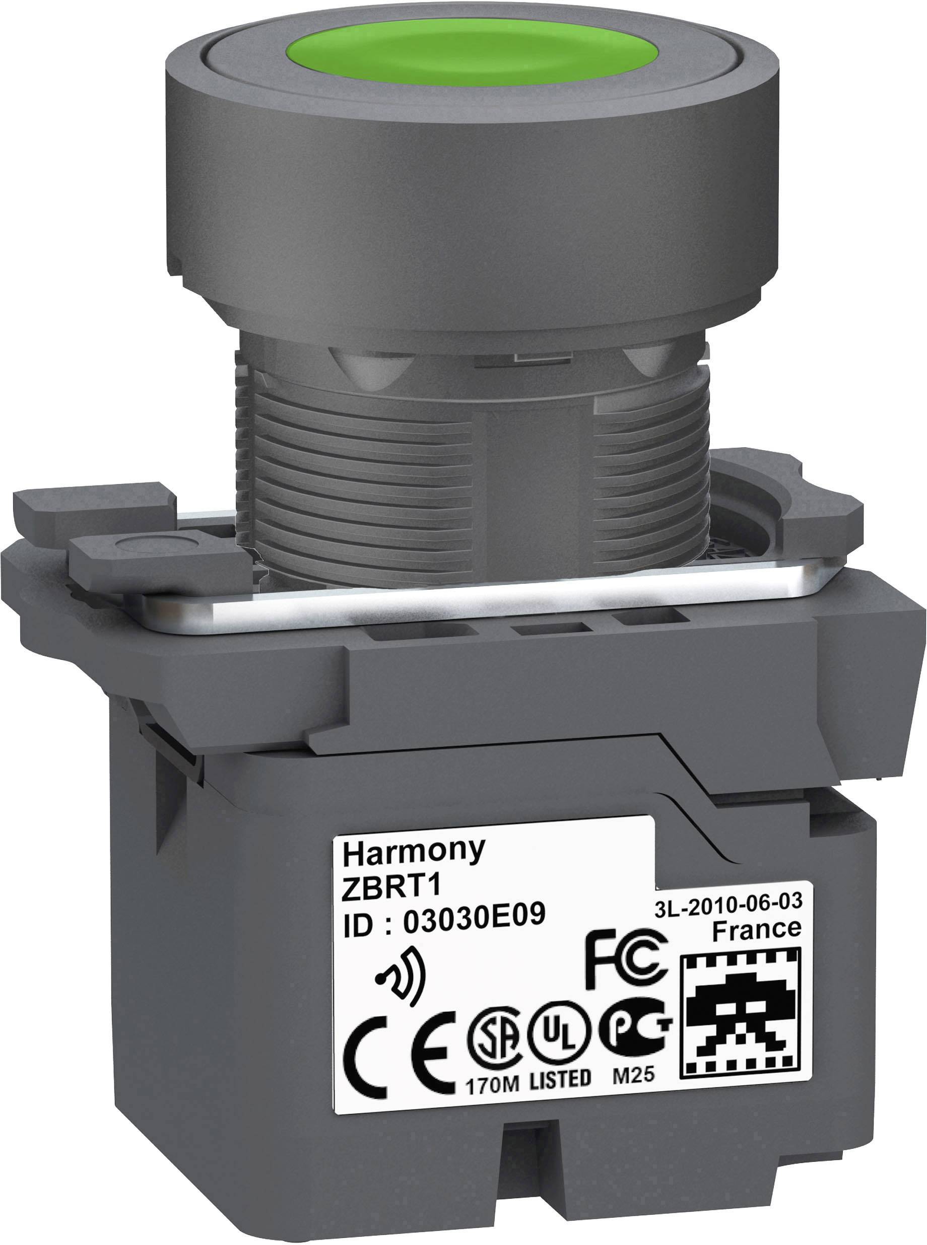 Un pulsante con testa verde illuminata e la marcatura 'Harmony ZBRT1'. Segni di certificazione sono visibili sulla base.