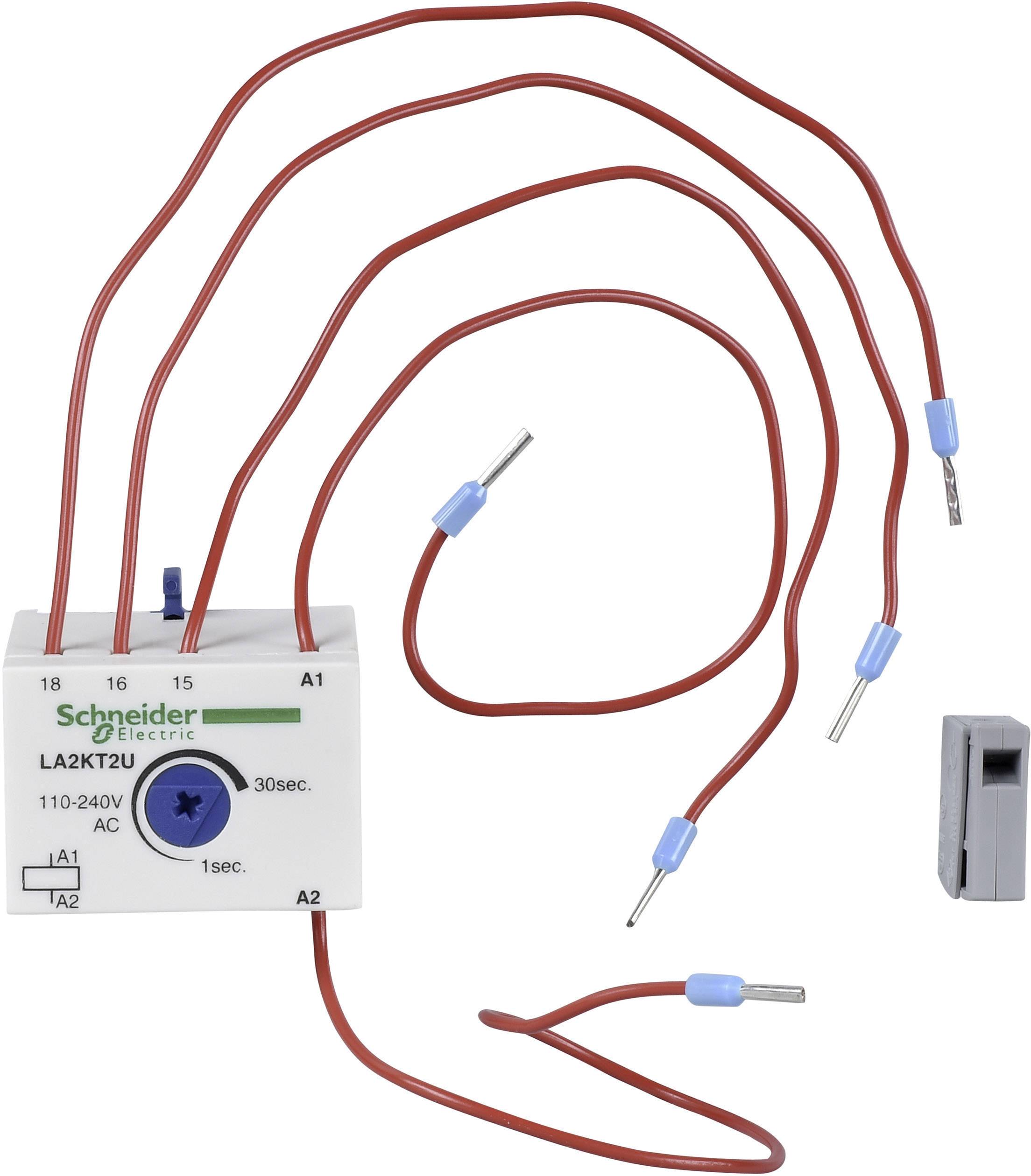 Un fascio di cavi rosso è collegato a un dispositivo elettrico bianco con la scritta 'Schneider Electric LA2KTU'.