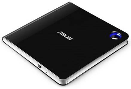 Un dispositivo ASUS nero, quadrato con angoli arrotondati e un elemento luminoso blu, probabilmente un'unità esterna.