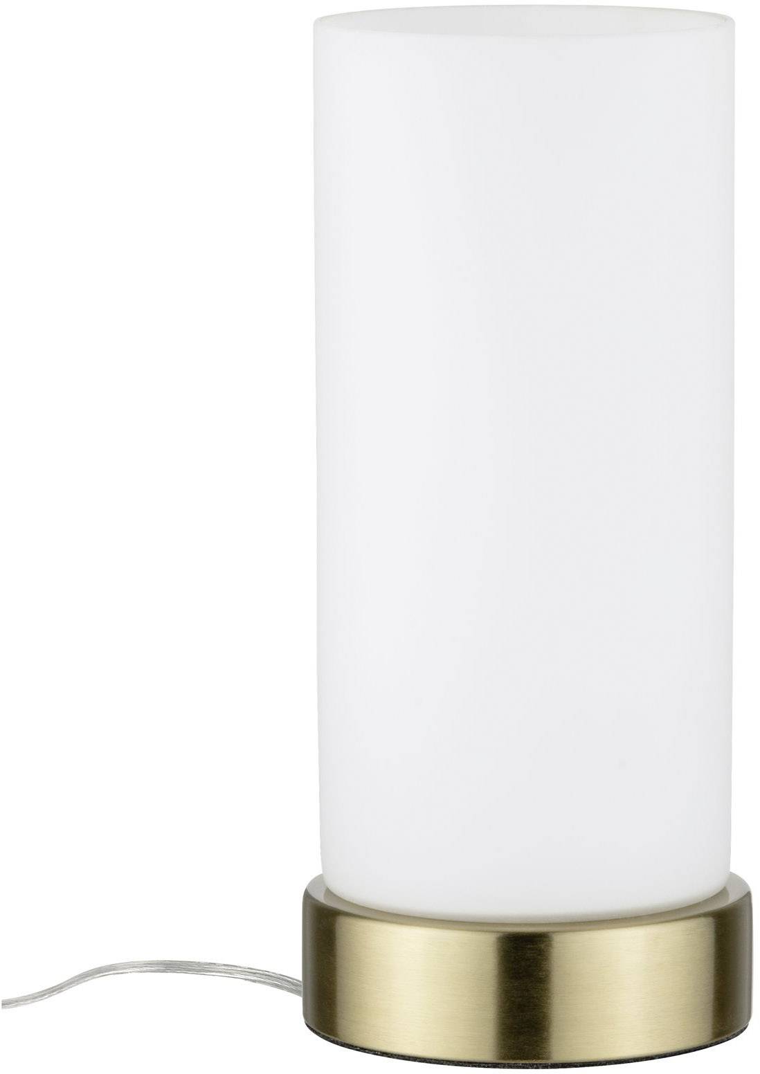Una lampada cilindrica con paralume bianco e base color ottone, posizionata su una superficie liscia.