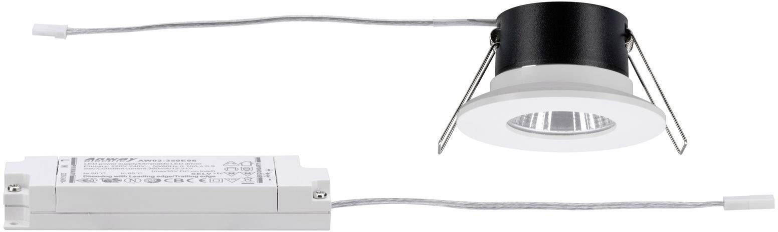 Un downlight LED da incasso rotondo, bianco con dettagli neri e due staffe metalliche, collegato a un trasformatore bianco.