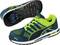 Scarpe sportive in blu e verde con suola bianca. Tomaia in mesh traspirante, allacciate. Logo del marchio sul lato.
