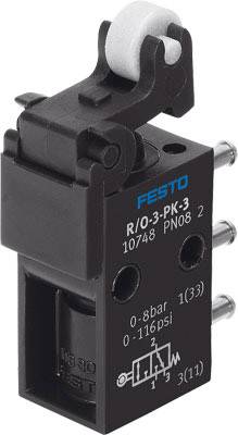Un valvola Festo R/0-3-PK-3 con pressione di esercizio da 0-8 bar (0-116 psi). Sono visibili i raccordi e uno schema elettrico.
