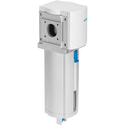 Un componente tecnico cilindrico, grigio, con un'apertura in alto ed elementi blu sui lati, presumibilmente un alloggiamento per filtro.