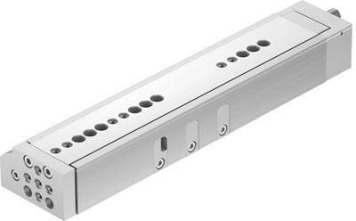 Un cilindro pneumatico rettangolare con multiple connessioni e fori di montaggio sulla parte superiore, per applicazioni industriali.