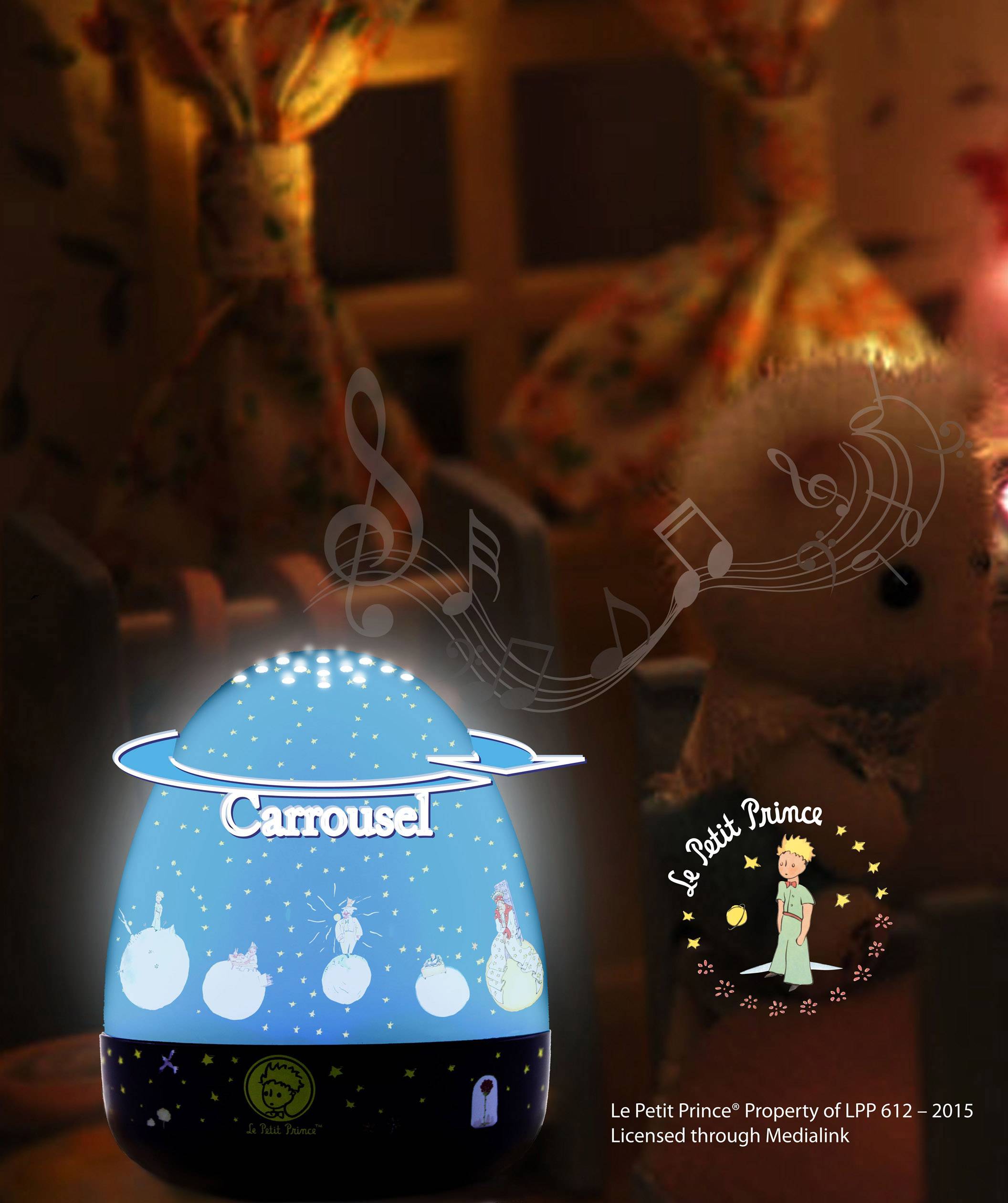 Una luce notturna con il motivo de 'Il Piccolo Principe' e la parola 'Carrousel' in un ambiente accogliente e illuminato.