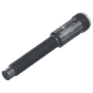 Un cuneo di tensione nero, cilindrico, con asta scanalata e superficie etichettata. Componente tecnico, utilizzato nella costruzione di macchine.
