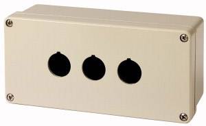 Custodia in plastica beige con tre aperture circolari per interruttori o indicatori, fissata agli angoli con viti. Adatta per applicazioni industriali.