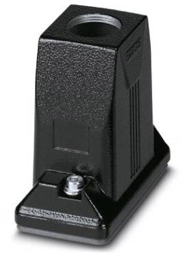 Blocco metallico nero rettangolare con un foro allungato nella parte superiore e una piccola vite sul fondo; probabilmente un piedino per dispositivo.