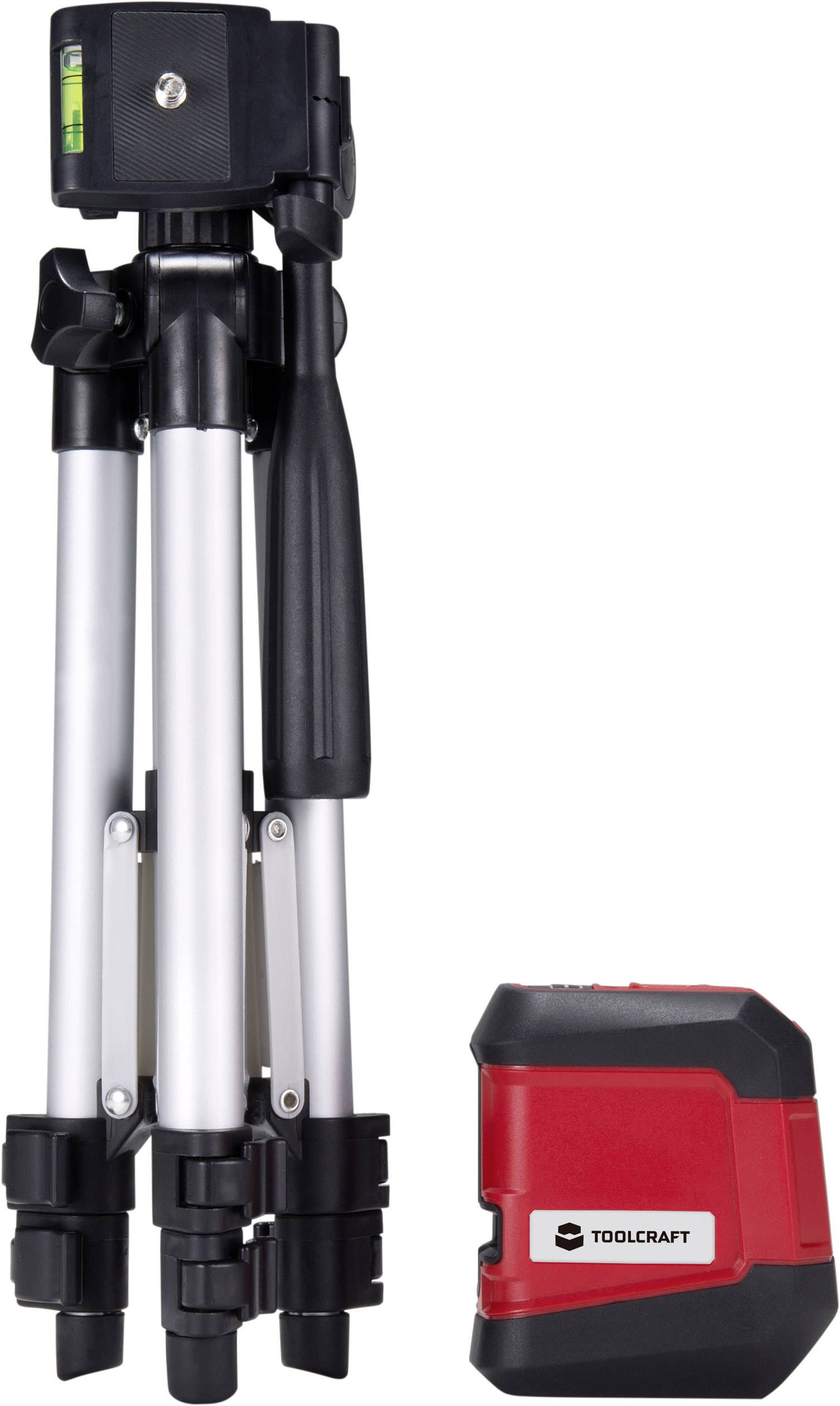 Un dispositivo di livellamento laser Toolcraft di colore rosso accanto a un treppiede ripiegabile argento e nero con livella integrata.